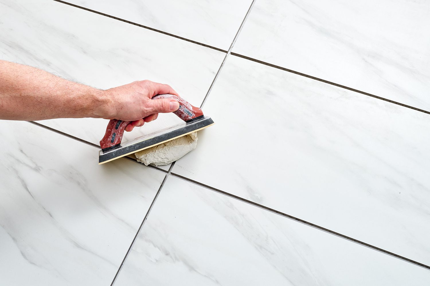 how to grout a tile floor 5208084 hero b781e1682f3e442ca8f199718bb9bc6d