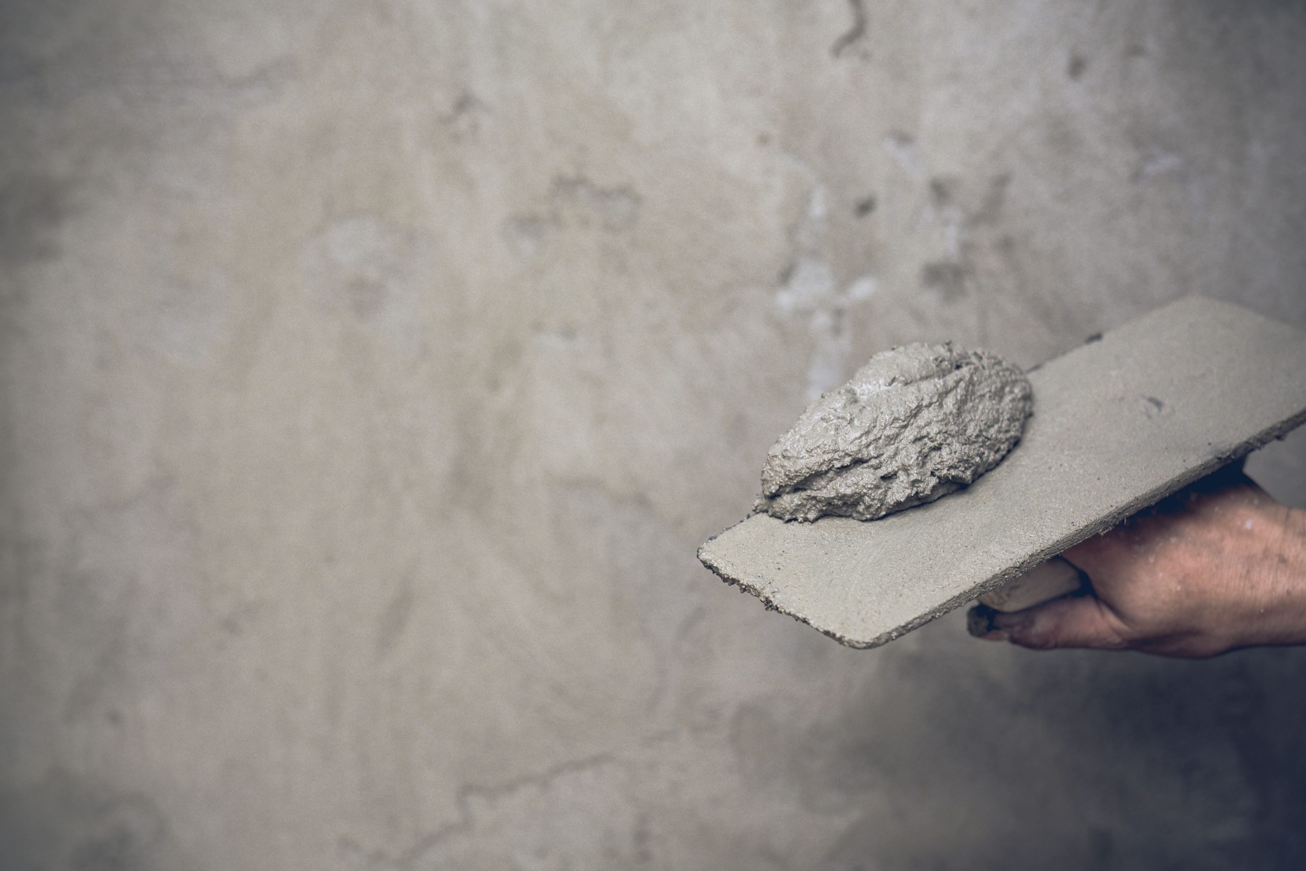 plasterer renovating indoor walls